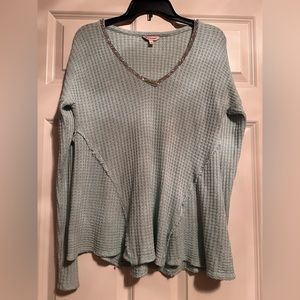 Juicy Couture woven turquoise dressy top edged in sparkles at the neckline.